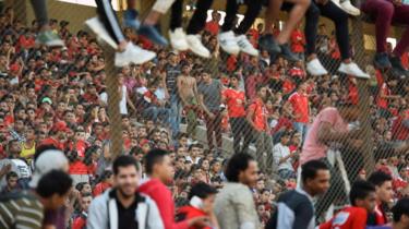 Egyptian fans gather at a stadium in Cairo on 31 October 2017 ahead of the last training session of the Al-Ahli club football team before heading to Morocco for the final of the African Champions League.