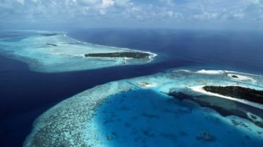 Aerial shot of atolls in the Maldives