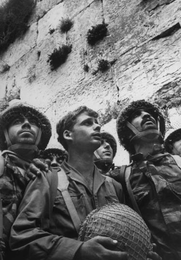 Israeli paratroopers gaze at Western Wall moments after recapture of Jewish holy site in Six-Day War, 1967