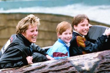 Diana, Princess of Wales, with sons Prince William and Prince Harry during a visit to Thorpe Park amusement park in 1993