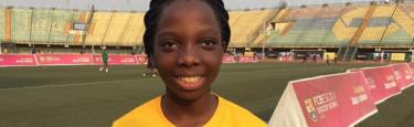 Imalashe Sulyman, the only girl recruit at the Barcelona Academy in Lagos, stands on the football pitch.