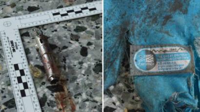 Possible detonator and backpack remnants