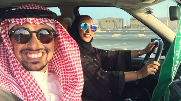Faisal BaDughaish and wife driving in a carpark