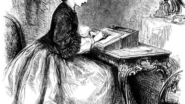 Una mujer escribiendo
