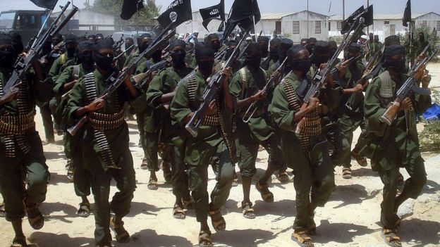 Al-Shabab fighters perform military drills at a village about 25km outside Mogadishu