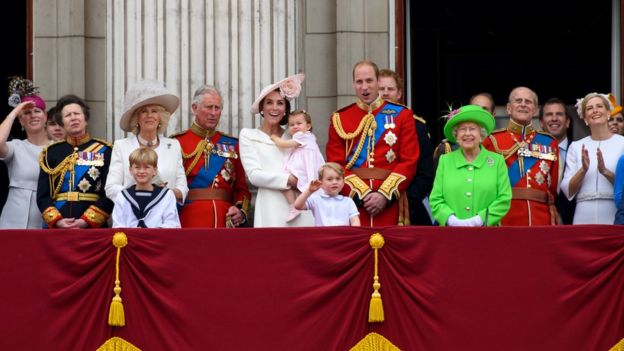 Members of the Royal family stand on the balcony of Buckingham Palace to watch a fly-past of aircrafts by the Royal Air Force in London in 2016