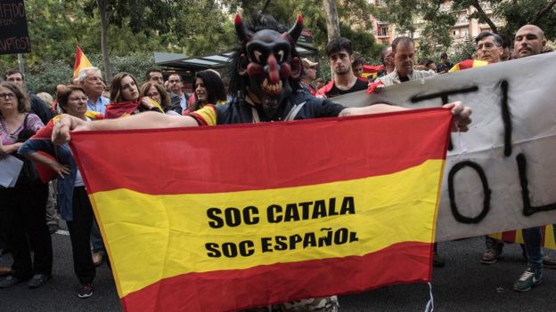 Man with flag saying 