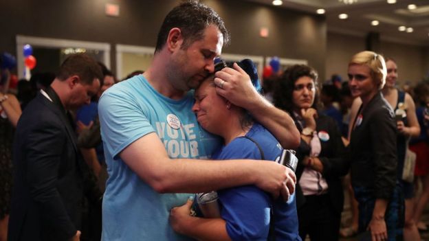 Supporters of Jon Ossoff are overcome with emotion during the candidate's concession speech on eleciton night.