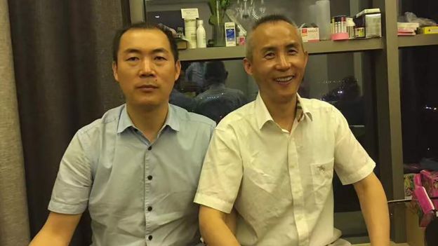 维权律师李和平(右)