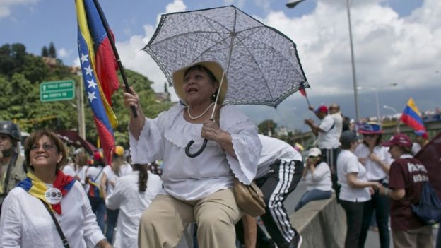 A woman during a protest demanding a recall referendum against Venezuela