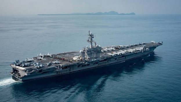 FILEPHOTO: The U.S. aircraft carrier USS Carl Vinson transits the Sunda Strait, Indonesia on April 15, 2017