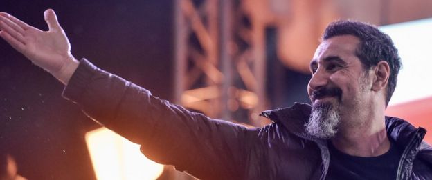 Serj Tankian of rock group System of a Down is welcomed by protesters in the centre of Yerevan on the eve of the vote (7 May)