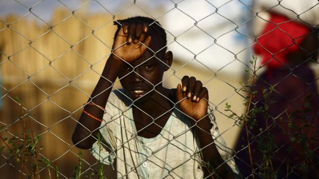 A South Sudanese refugee child stands at the UNHCR camp of al-Algaya in Sudan