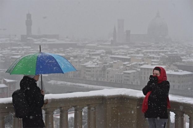 A view of snow falling over Florence, Italy, 1 March 2018