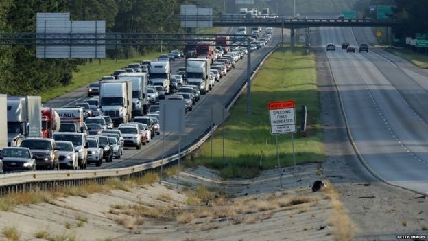 Northbound lanes of I-95 near the Georgia-South Carolina border are empty as northbound lanes are packed as people evacuate ahead of the arrival of Hurricane Irma September 8, 2017 in Yemassee, South Carolina