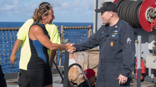 Jennifer Appel is welcomed on board the USS Ashland by Command Master Chief Gary Wise, 25 October 2017