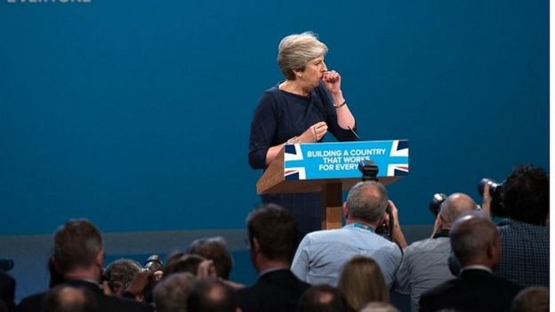 Theresa May coughing during conference speech