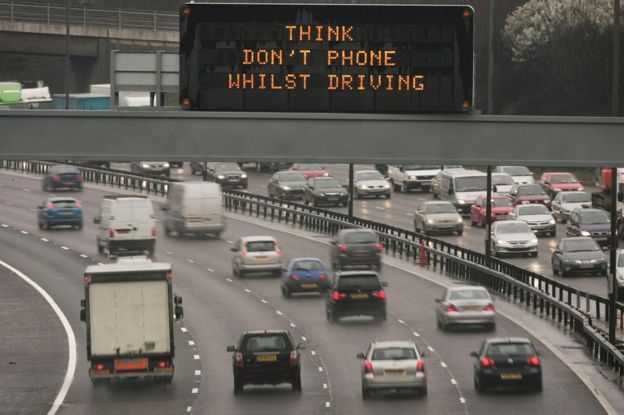 File photo from 2007 showing safety message displayed above motorway traffic.