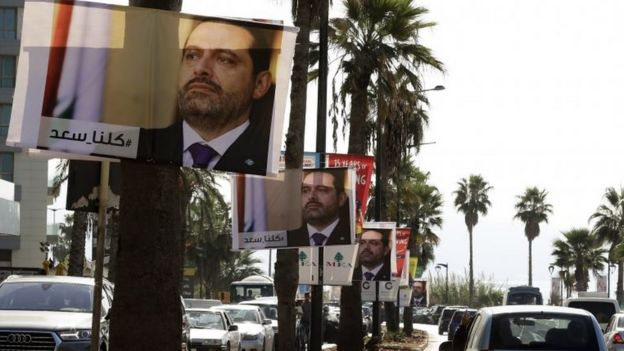 Posters of Lebanese Prime Minister Saad Hariri hang on Beirut streets on 10 November 2017