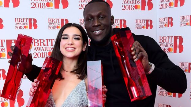 Stormzy and Dua Lipa with their Brit Awards
