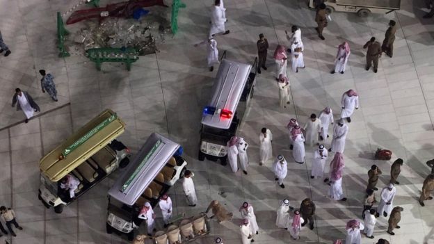 Saudi emergency teams stand inside the Grand Mosque, Mecca, 11 September 2015