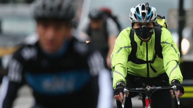 London cyclist wearing face mask