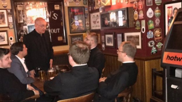 Priests in pub