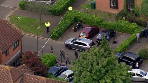 Police searching a residential property in Stanwell