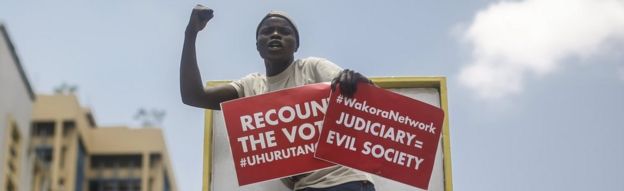 Supporters of President Uhuru Kenyatta and his Jubilee party protest against the country's Supreme Court, which ruled in favour of opposition leader Raila Odinga and overturned the presidential election held on 8 August 2017, in downtown Nairobi, Kenya, 19 September 2017