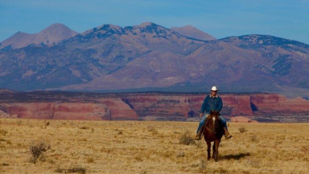 Adams a caballo en Utah.
