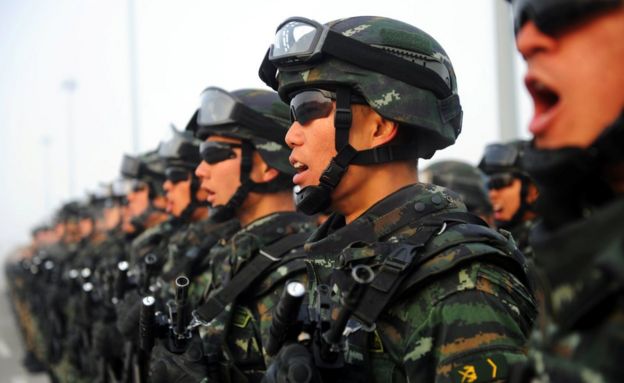 Paramilitary policemen stand in formation as they take part in an anti-terrorism oath-taking rally, in Kashgar, Xinjiang Uighur Autonomous Region, China, February 27, 2017.