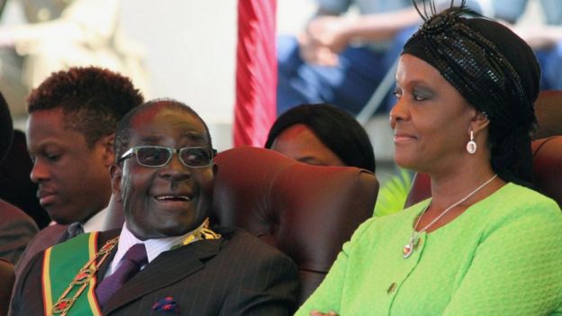 Zimbabwe"s President Robert Mugabe and his wife Grace attend a Defence Force Day rally in Harare, Zimbabwe August 12, 2014