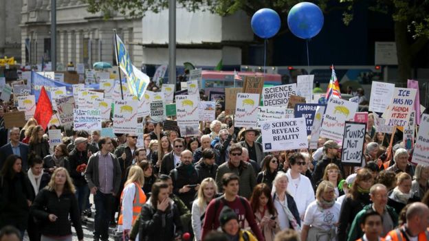 Scientists and science enthusiasts participate in the March for Science in central London, 22 April 2017
