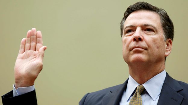 FBI Director James Comey is sworn in before testifying at a House Oversight and Government Reform Committee on the 