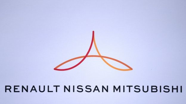 Renault-Nissan-Mitsubishi logo is displayed during a 2017 press conference