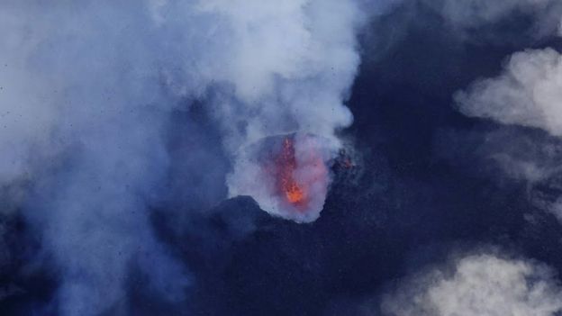 A cloud of smoke from Monaro volcano is seen on Vanuatus northern island Ambae in the South Pacific, September 25, 2017 in this aerial picture