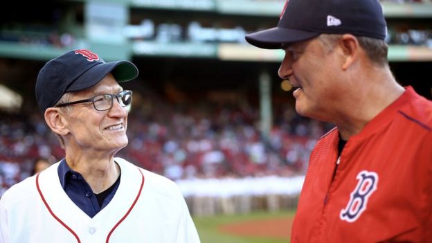 Apple chief executive Tim Cook, left, with Red Sox general manager John Farrell