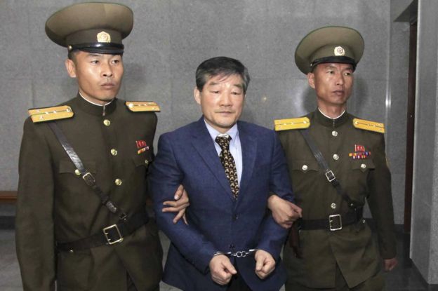 Kim Dong-chul, centre, a US citizen detained in North Korea, is escorted to his trial Friday, 29 April 2016, in Pyongyang, North Korea