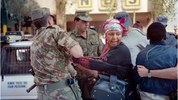 Winnie Mandela being arrested in 1991 while staging a protest calling for the release of detainees on hunger strike