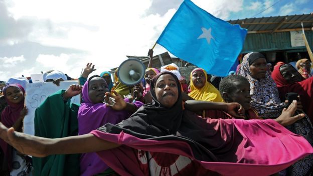 Demonstrators attend a protest against Al shabab insurgents outside Lido beach in the Somali capital Mogadishu