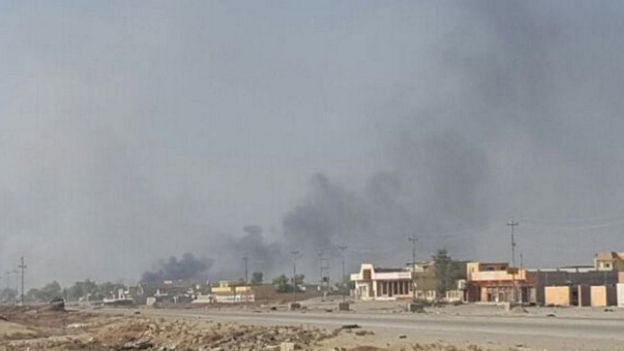 Smoke rises from Mosul's Karama district on 31 October 2016