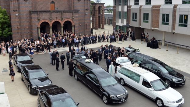 Family and friends at the funeral of Lars, Vivian and Annabelle Falkholt