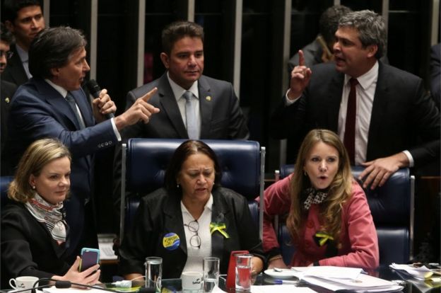 Opposition senator Lindberg Farias argues with Senate President Eunicio Oliveira during the session for a vote on labor reform, in Brasilia, Brazil on 11 July, 2017.