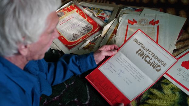 Vladimir Voskresenskiy looking at a document