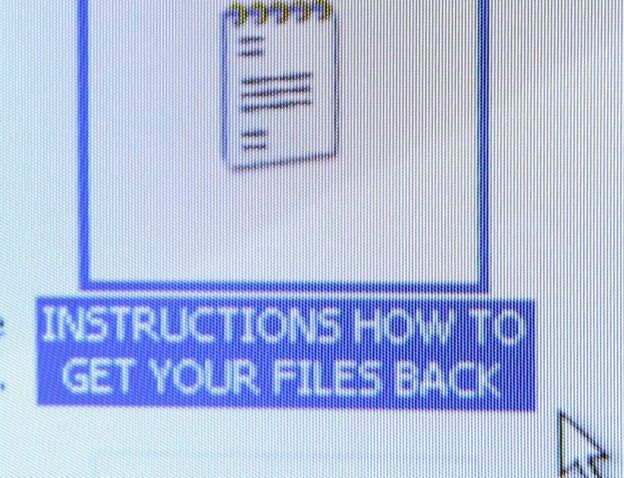 Pantalla con instrucciones para recuperar sus archivos