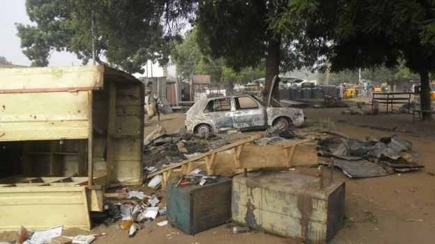 Scene of an explosion in a mobile phone market in Potiskum, Nigeria, Monday Jan. 12, 2015. Two female suicide bombers targeted the busy marketplace on Sunday.