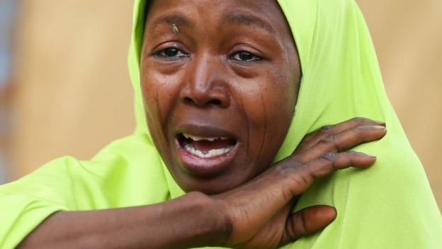 A relative of one of the missing school girls cries in Dapchi. Photo: 23 February 2018