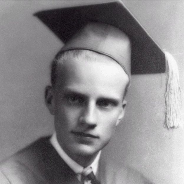 Billy Graham cap and gown at age 17 on his graduation from Charlotte High School.