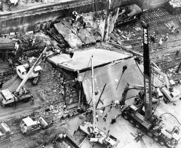 The train derailed and hit a bridge, forcing it to collapse