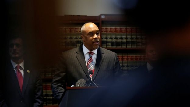 US attorney Robert Capers, centre, pictured at a press conference on Friday 20 January